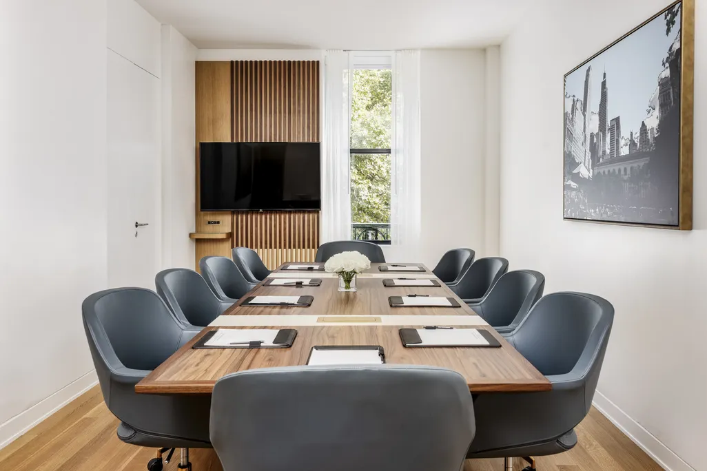 Boardroom Suite meeting table with skyline view