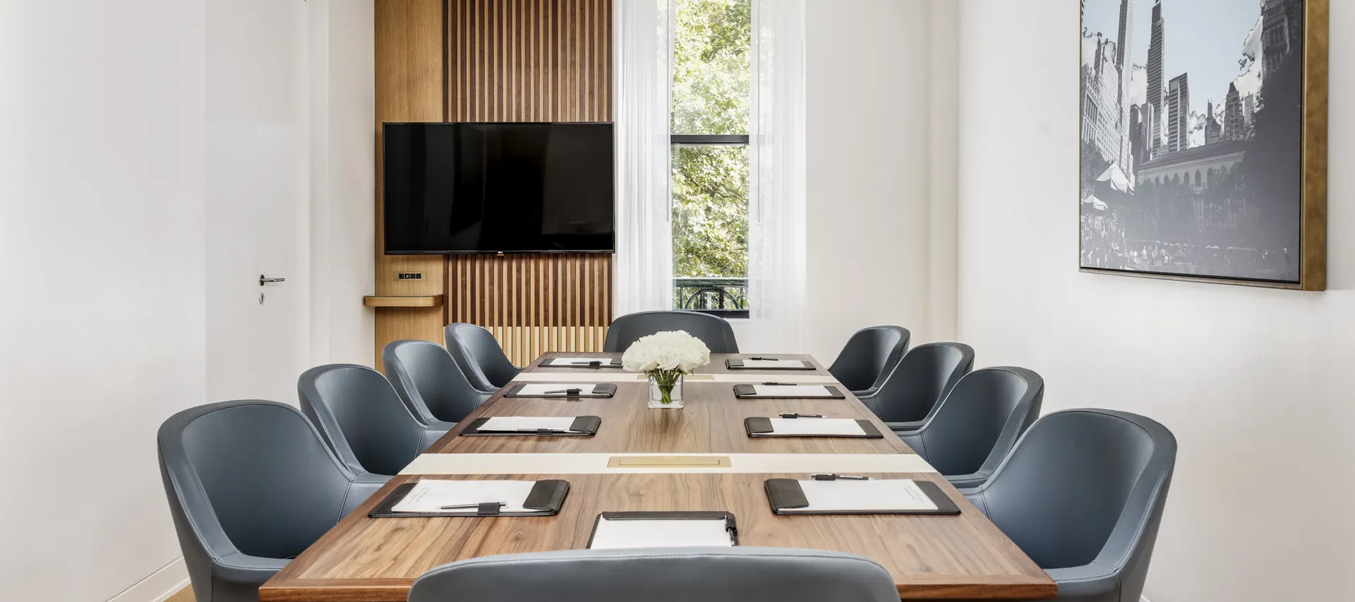 Boardroom Suite meeting table with skyline view