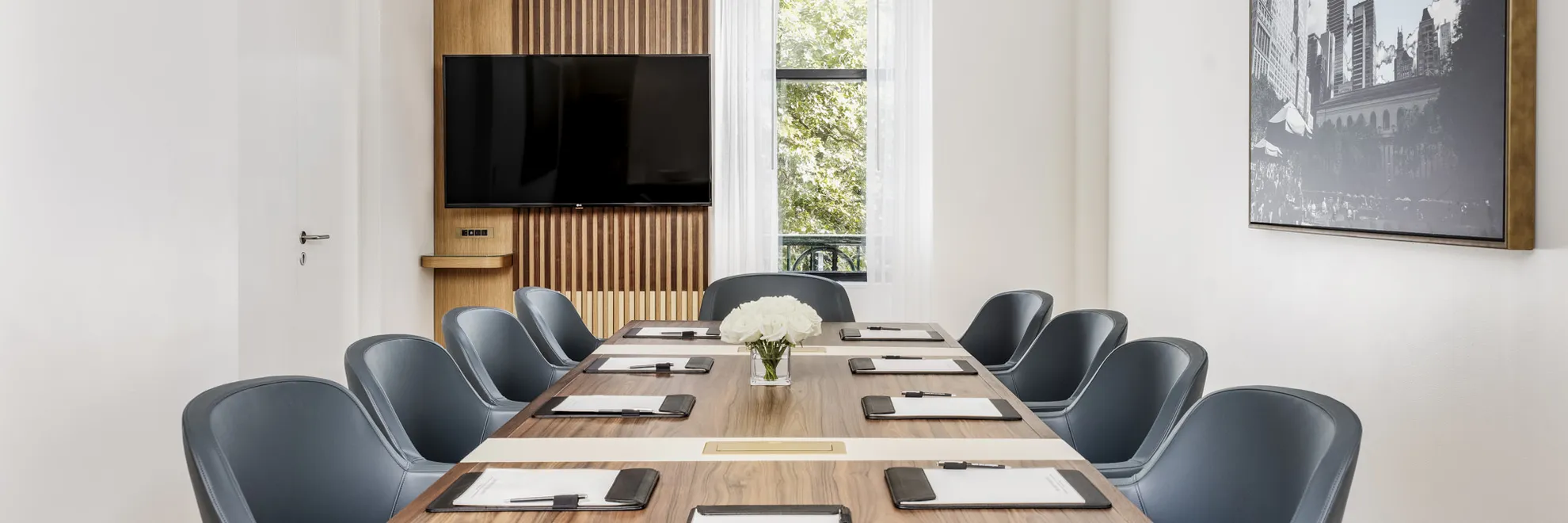 Boardroom Suite meeting table with skyline view