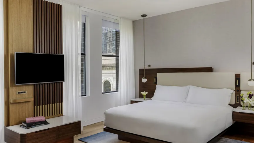 Junior Suite Park View bedroom during the day, alternate view