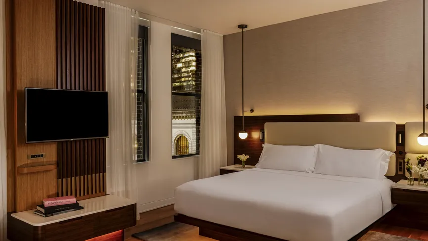 Junior Suite Park View bedroom at night, alternate view