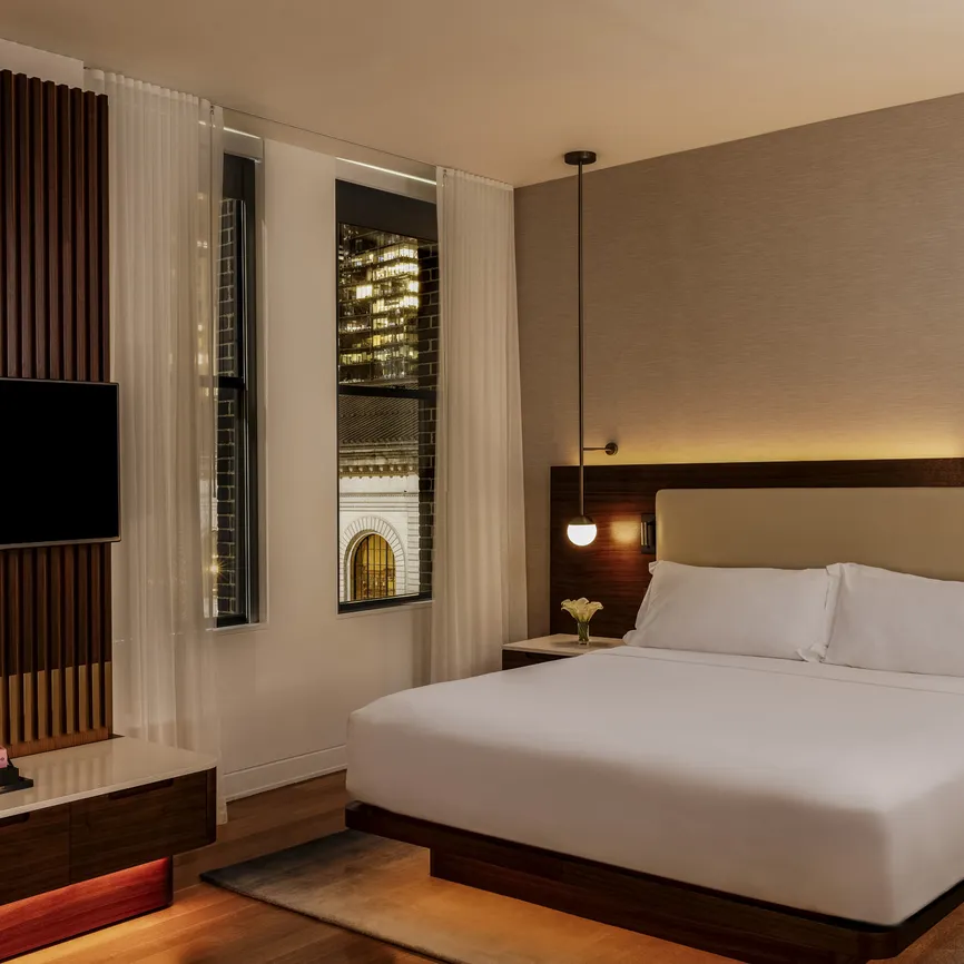 Junior Suite Park View bedroom at night, alternate view