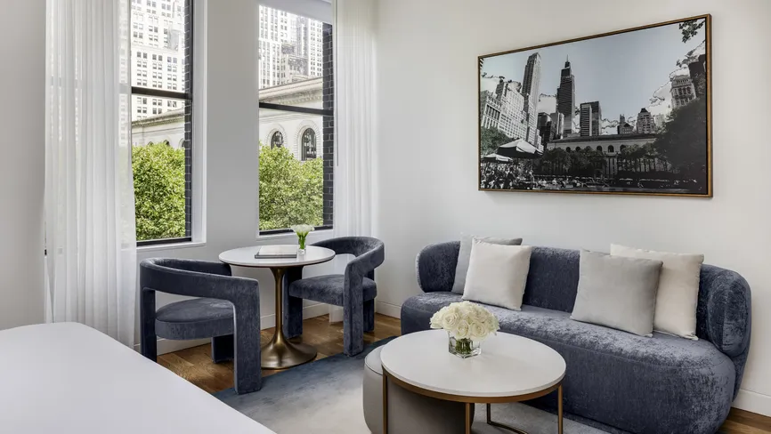 Bryant Park Suite living room with seating area and park view