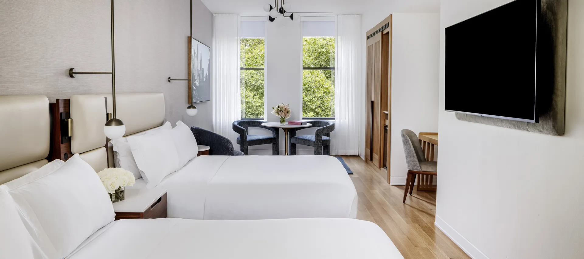 Deluxe Two Beds Park View room during the day