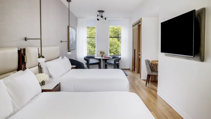 Deluxe Two Beds Park View room during the day