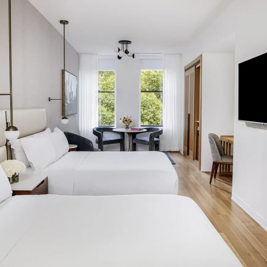 Deluxe Two Beds Park View room during the day