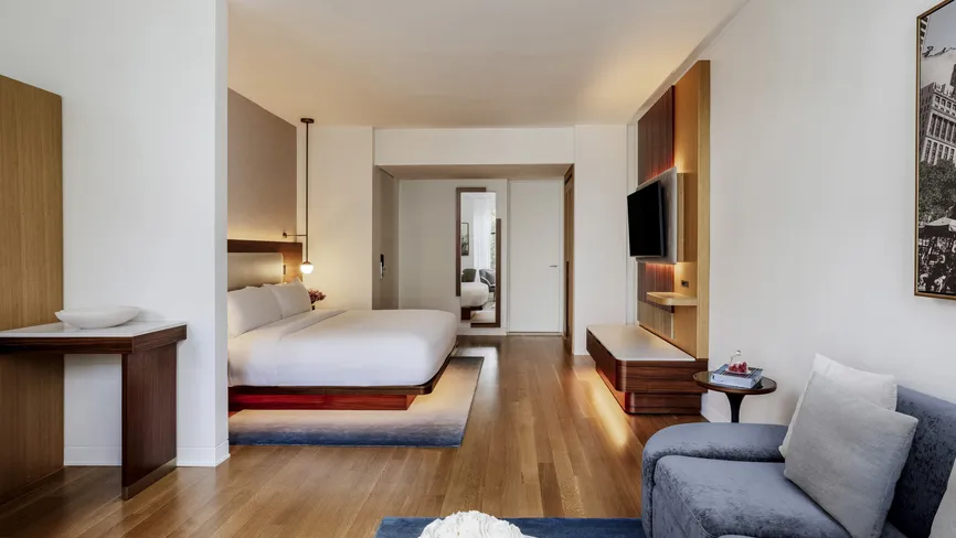 Bryant Park Studio Suite living room with lights on