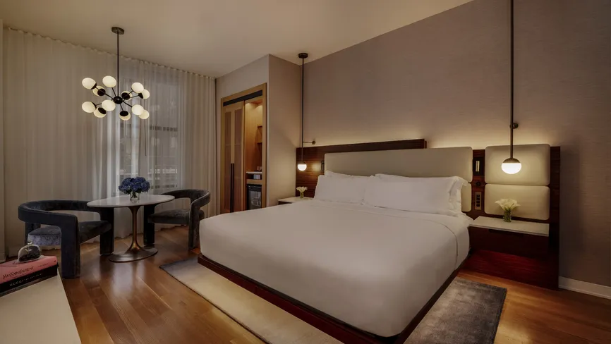 Deluxe King room bedroom at night