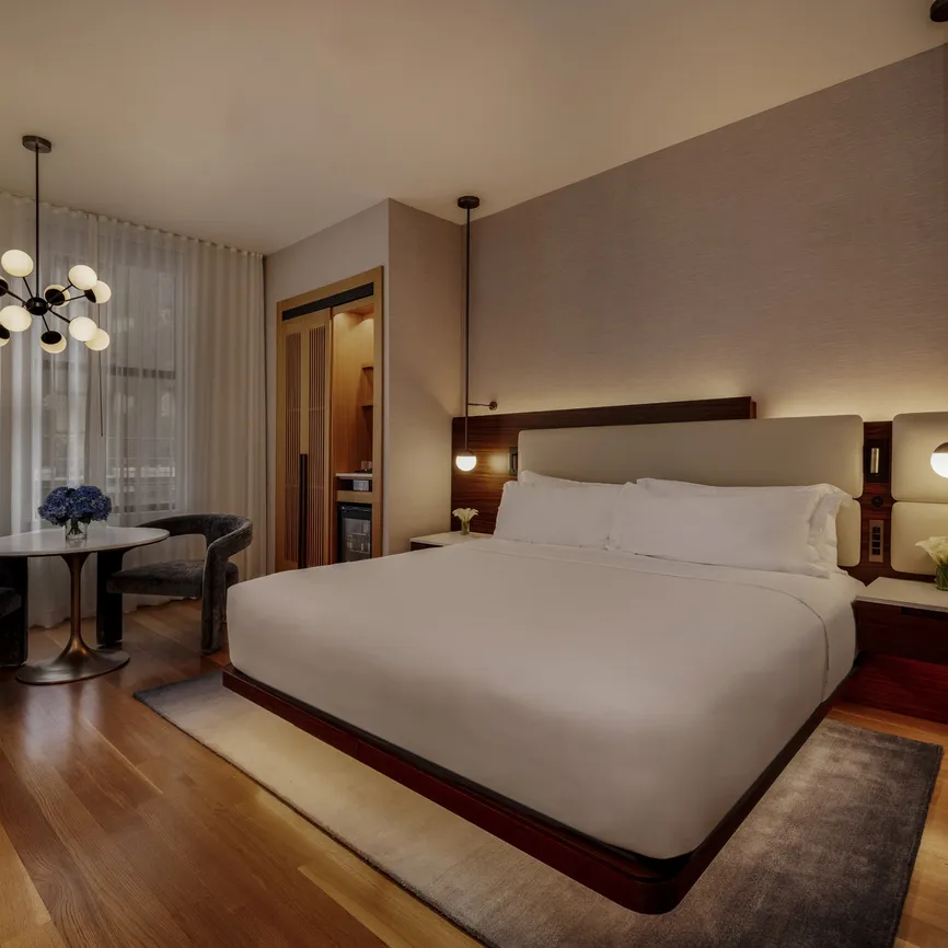 Deluxe King room bedroom at night