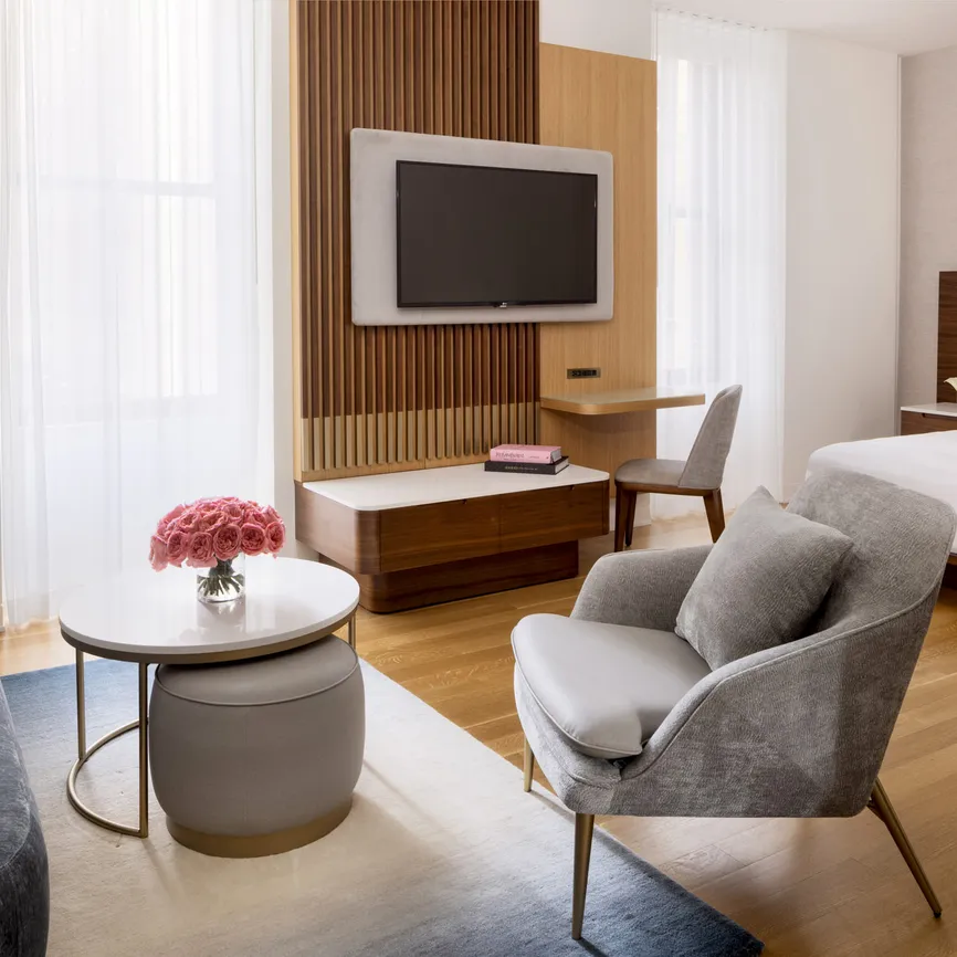 Junior Suite City View - Bedroom w/TV - Night - Hotel Room NYC Bryant Park Hotel - Midtown Hotel