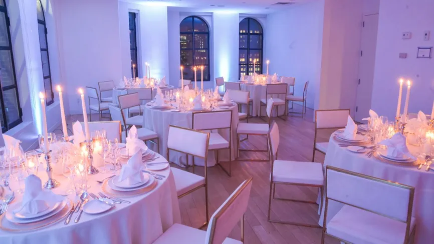 Conference Room set for a formal dinner with blue mood lighting