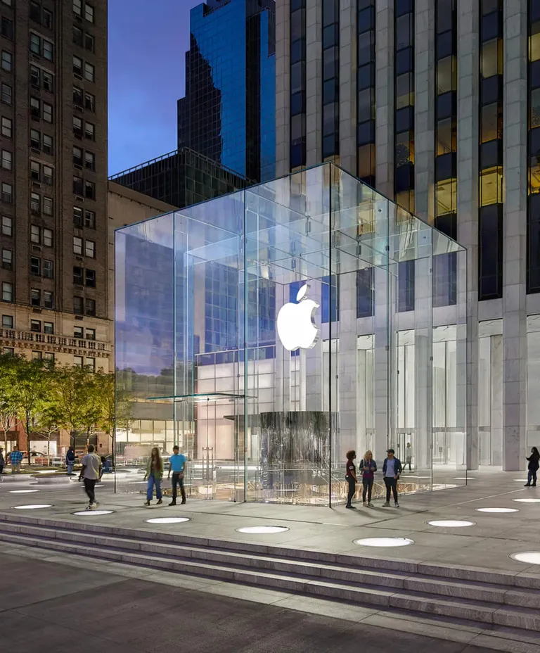 Apple Fifth Avenue glass cube store entrance at dusk