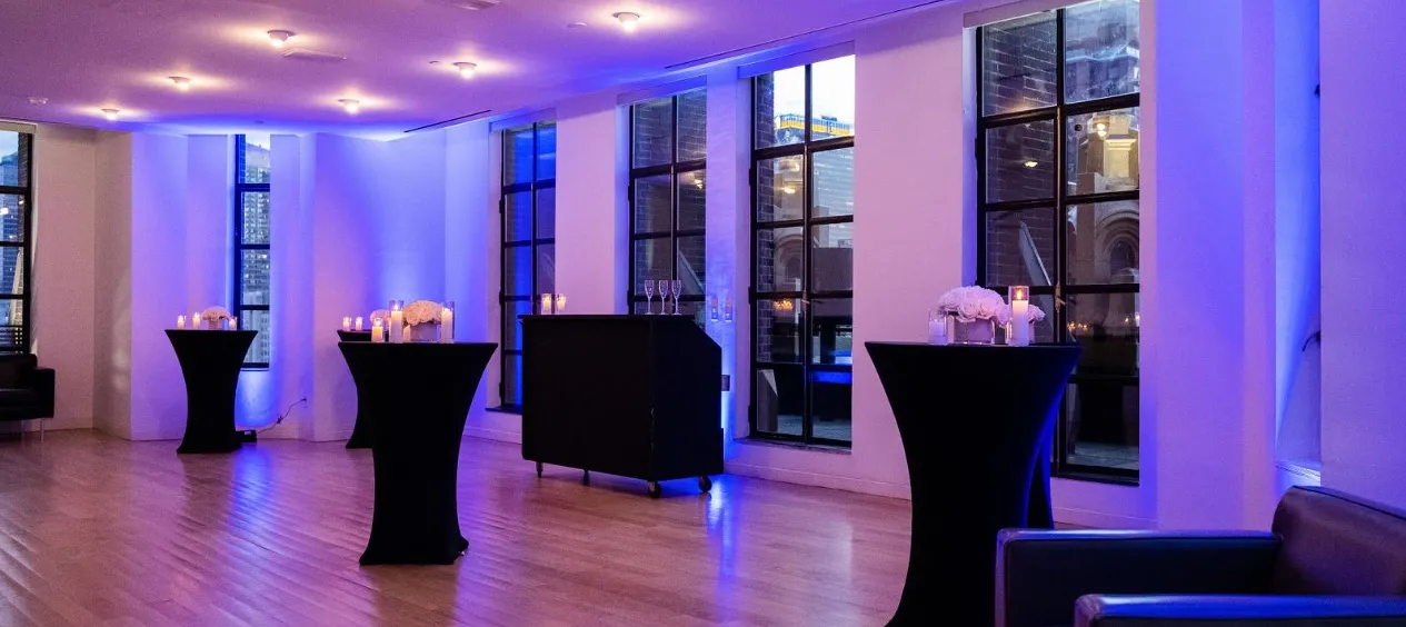 Conference Room set for a reception with purple lounge seating