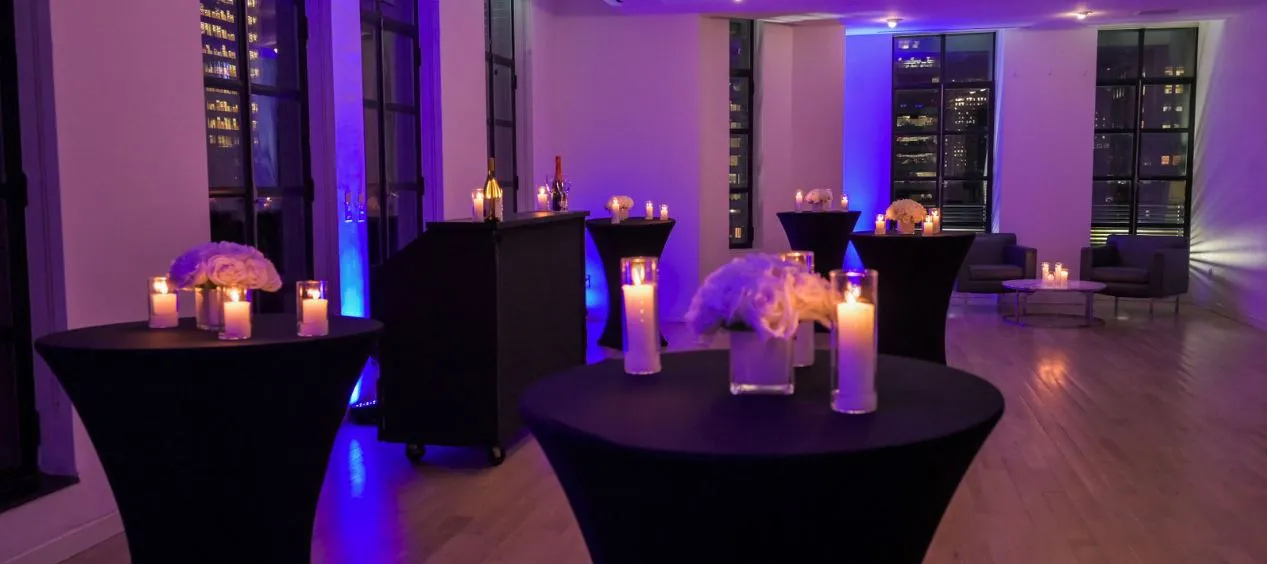 Conference Room set for a cocktail reception with purple lighting