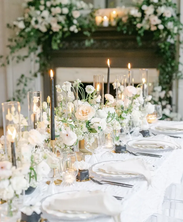 Gotham Hall elegant wedding table setting with candles and floral garland