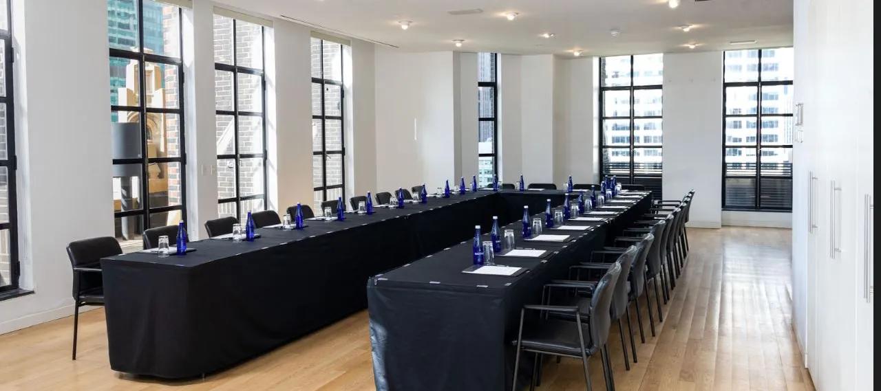 Conference Room set up boardroom-style with rectangular table
