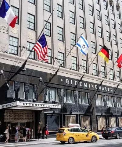 Bloomingdale’s department store exterior entrance with flags
