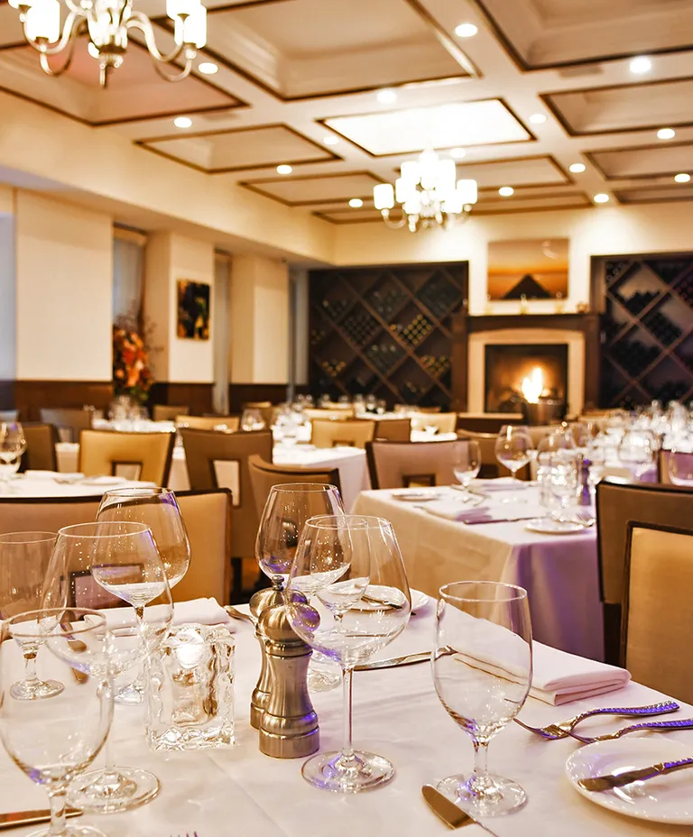 Restaurant dining room interior with purple mood lighting
