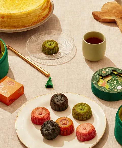Assorted boxed pastries and tea display
