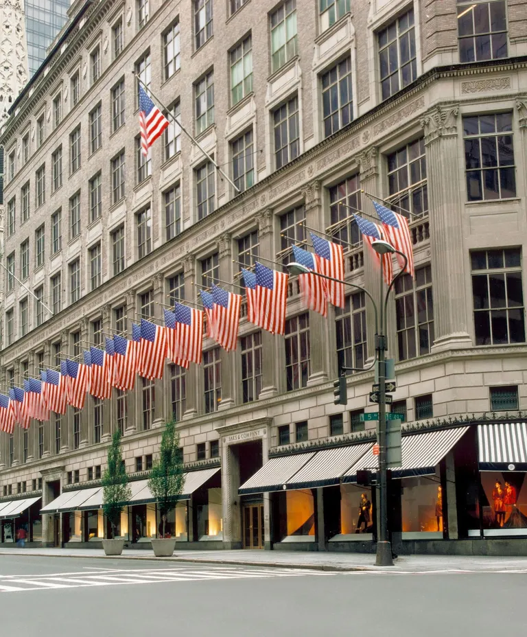 Saks Fifth Avenue store exterior with colorful flags